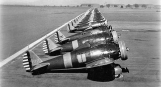 Peashooters of the 17th Pursuit Group lined up at March Field in California